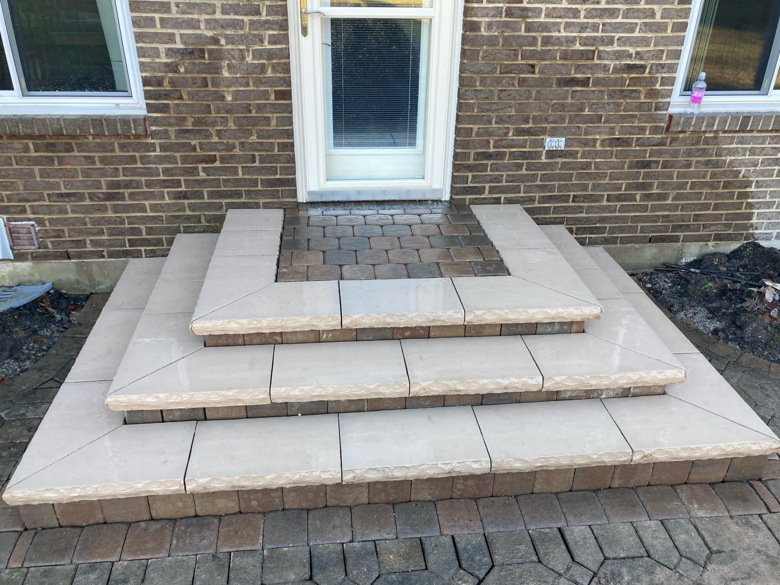 How can I upgrade failing outdoor paver patio steps for safety and