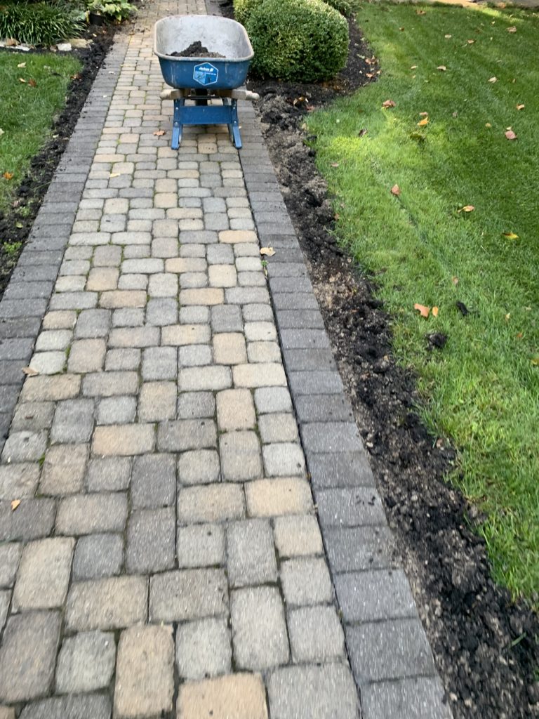 How to fix black paver edging